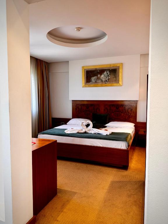 Postel nebo postele na pokoji v ubytování Hotel Exclusive