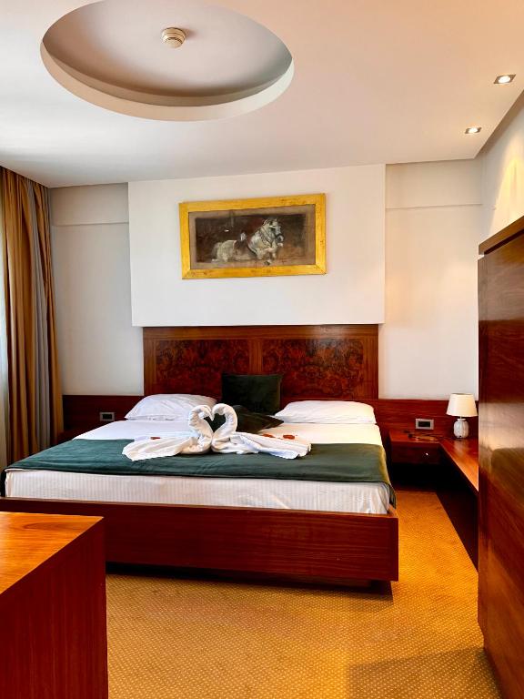 Postel nebo postele na pokoji v ubytování Hotel Exclusive
