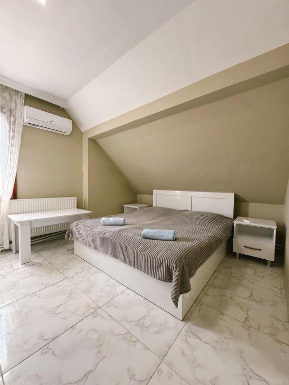 Postel nebo postele na pokoji v ubytování Guest House "Sulo"