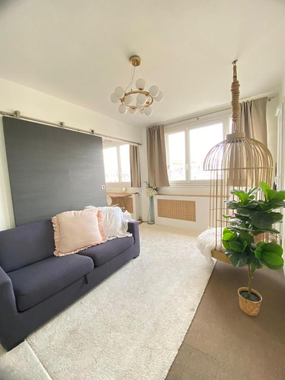 Area soggiorno di Eiffel Tower View - Charming Suite