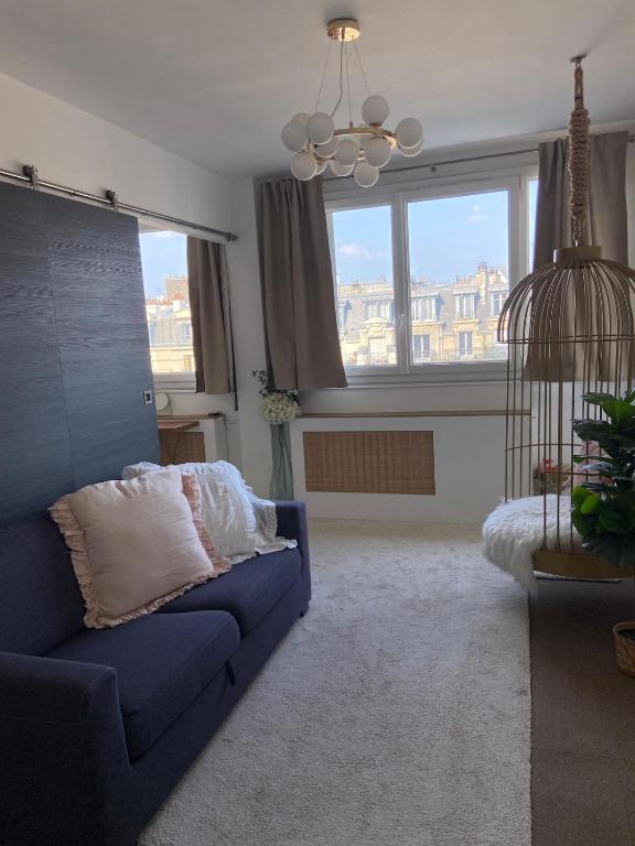 Area soggiorno di Eiffel Tower View - Charming Suite