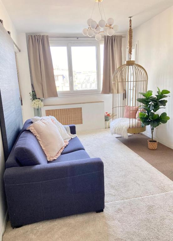 Area soggiorno di Eiffel Tower View - Charming Suite