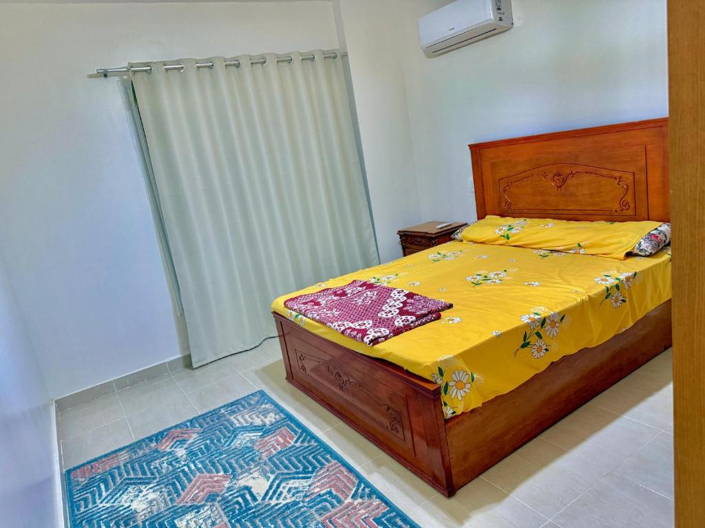 Letto o letti in una camera di شاليه بلومار السخنة blumar wadi degla