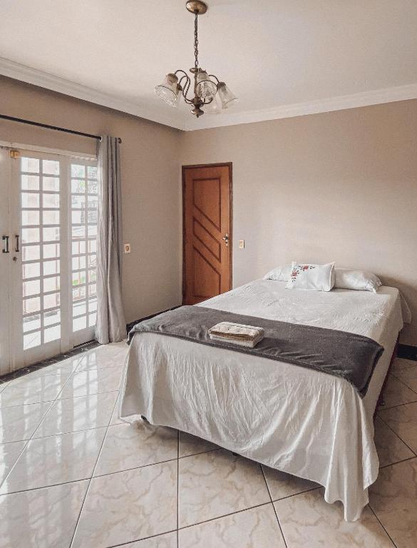Pousada Acessus - Com Cozinha e Lavanderia - Quarto Triplo Com Varanda