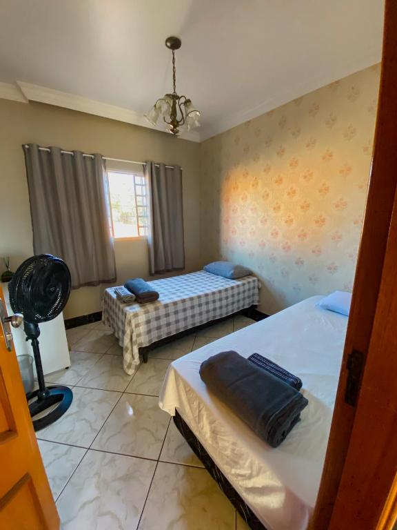 Pousada Acessus - Com Cozinha e Lavanderia - Quarto Triplo Com Banheiro Compartilhado