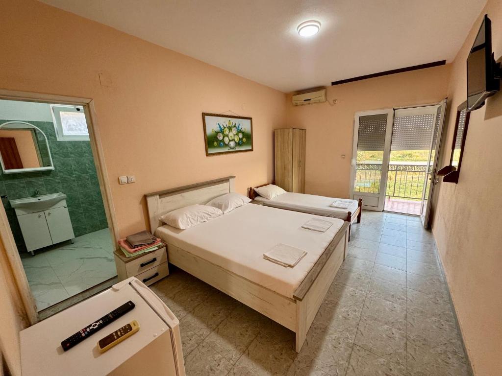 Postel nebo postele na pokoji v ubytování Magda apartments