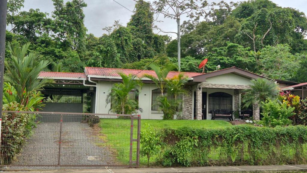 a house with a fence in front of it at Arboledas house by the River,Forest and Gardens in San Francisco