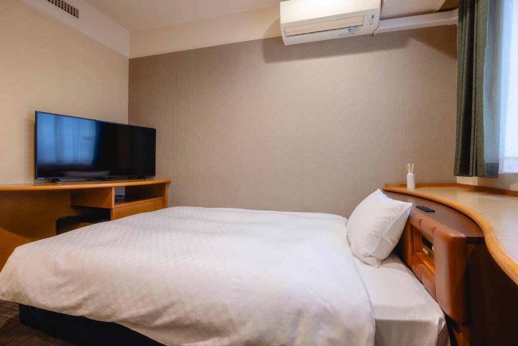 TV a/nebo společenská místnost v ubytování Kanku Izumiotsu Washington Hotel
