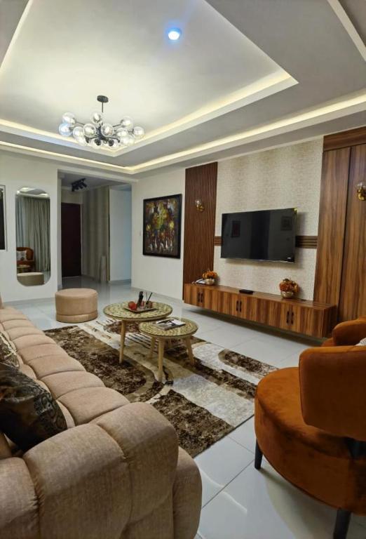 TV a/nebo společenská místnost v ubytování Luxe Haven