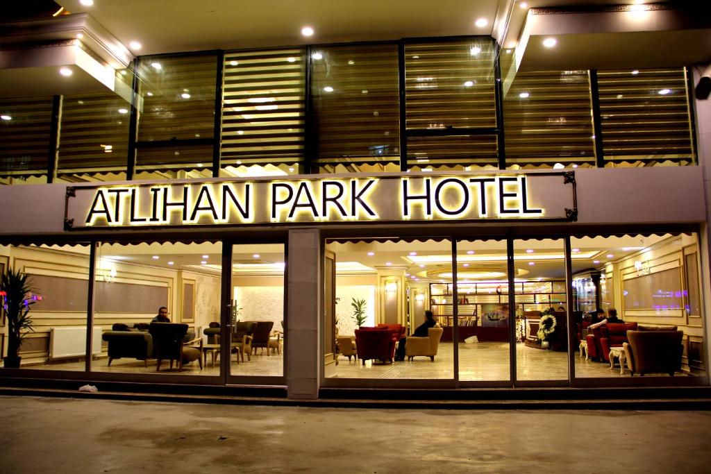 an entrance to an alilian park hotel at night at Atlıhanpark Hotel in Batman