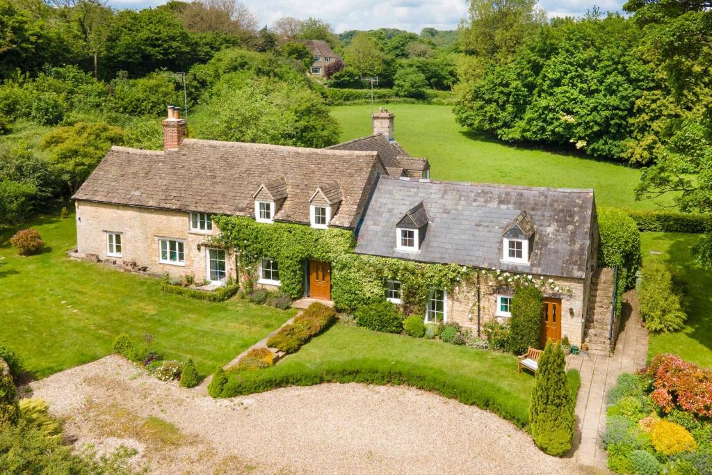 an aerial view of a large house at Stunning Cotswold Cottage Nr Country & River Walks in North Cerney