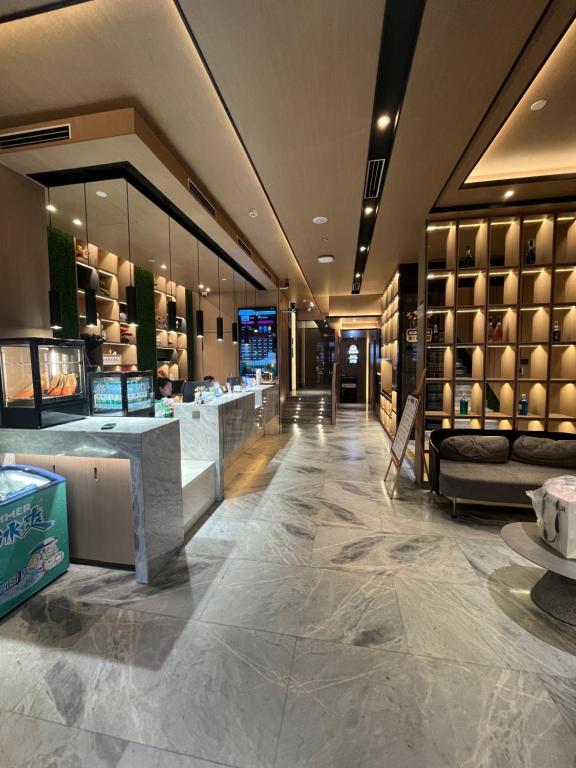Istumisnurk majutusasutuses Wenzhou Wuma Street Wenyuan Hotel is located in the heart of the city, easy to travel, free WiFi, breakfast, coffee, afternoon tea, free laundry service, recommended tourist attractions