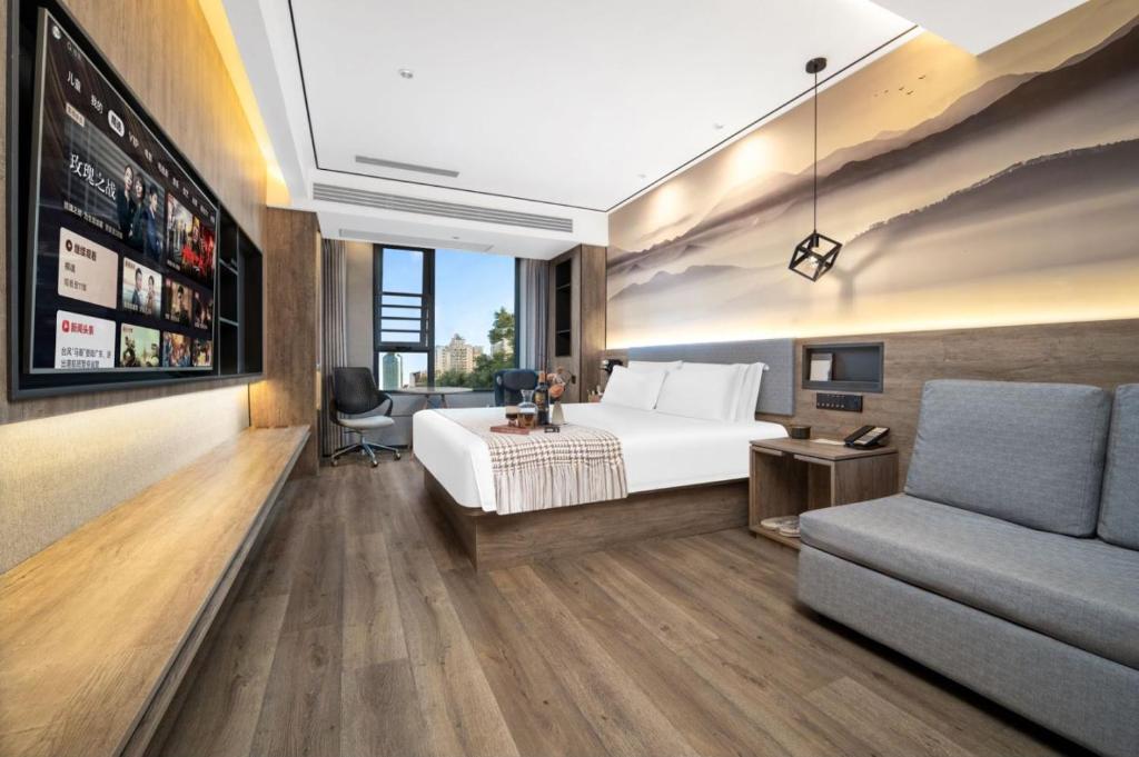 Istumisnurk majutusasutuses Wenzhou Wuma Street Wenyuan Hotel is located in the heart of the city, easy to travel, free WiFi, breakfast, coffee, afternoon tea, free laundry service, recommended tourist attractions