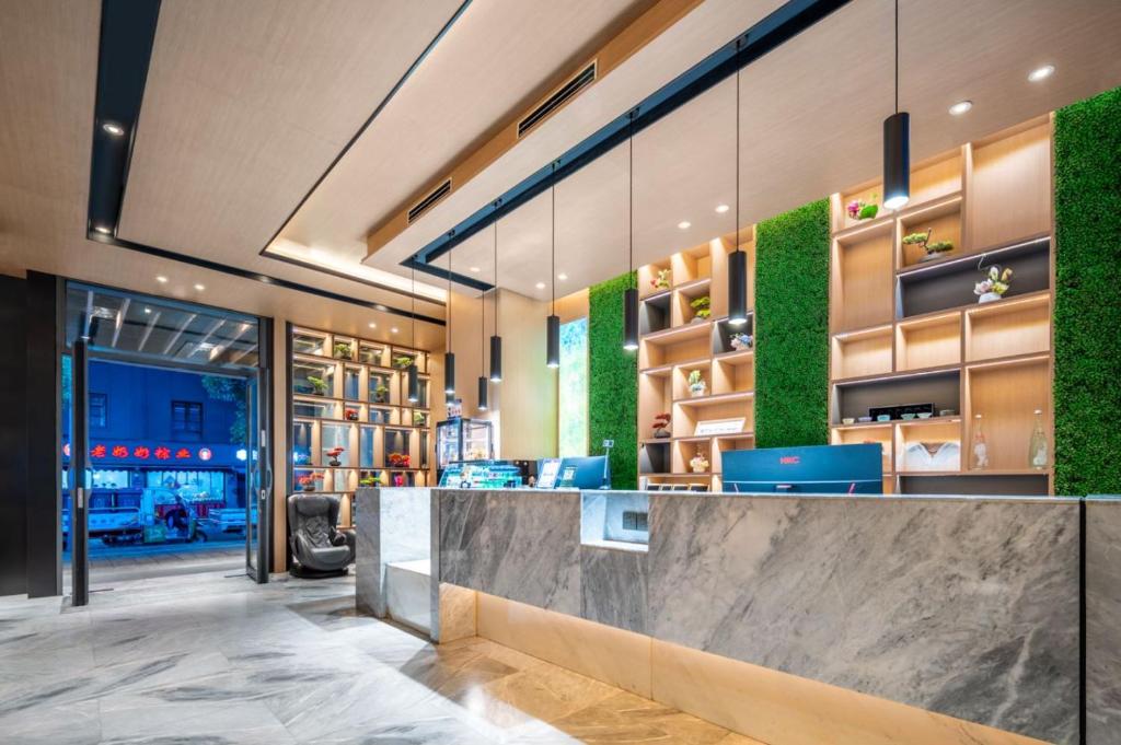 Foto sihtkohas Wenzhou asuva majutusasutuse Wenzhou Wuma Street Wenyuan Hotel is located in the heart of the city, easy to travel, free WiFi, breakfast, coffee, afternoon tea, free laundry service, recommended tourist attractions galeriist