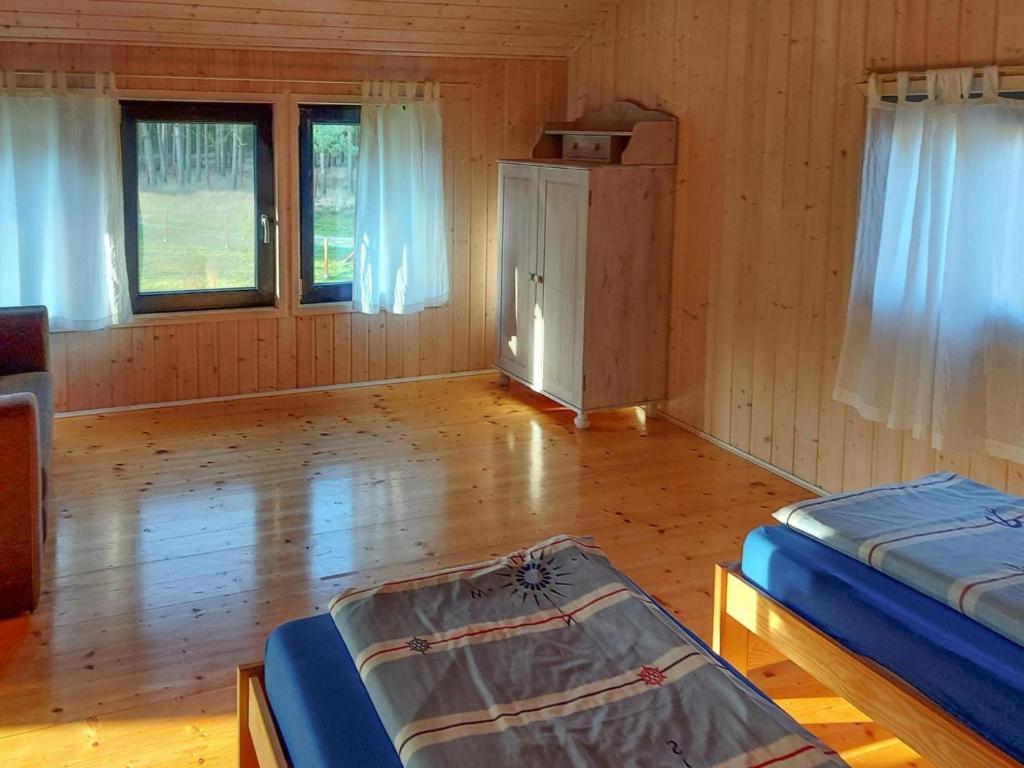 Posteľ alebo postele v izbe v ubytovaní holiday home in Nowe Warpno