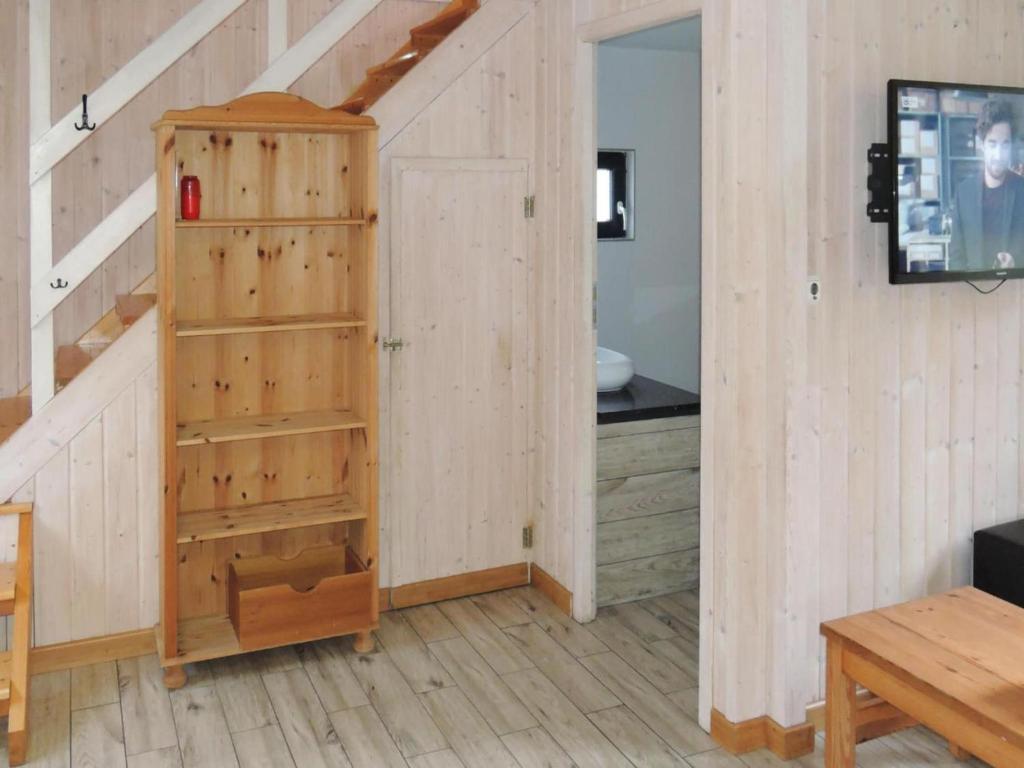 Televízia a/alebo spoločenská miestnosť v ubytovaní holiday home in Nowe Warpno