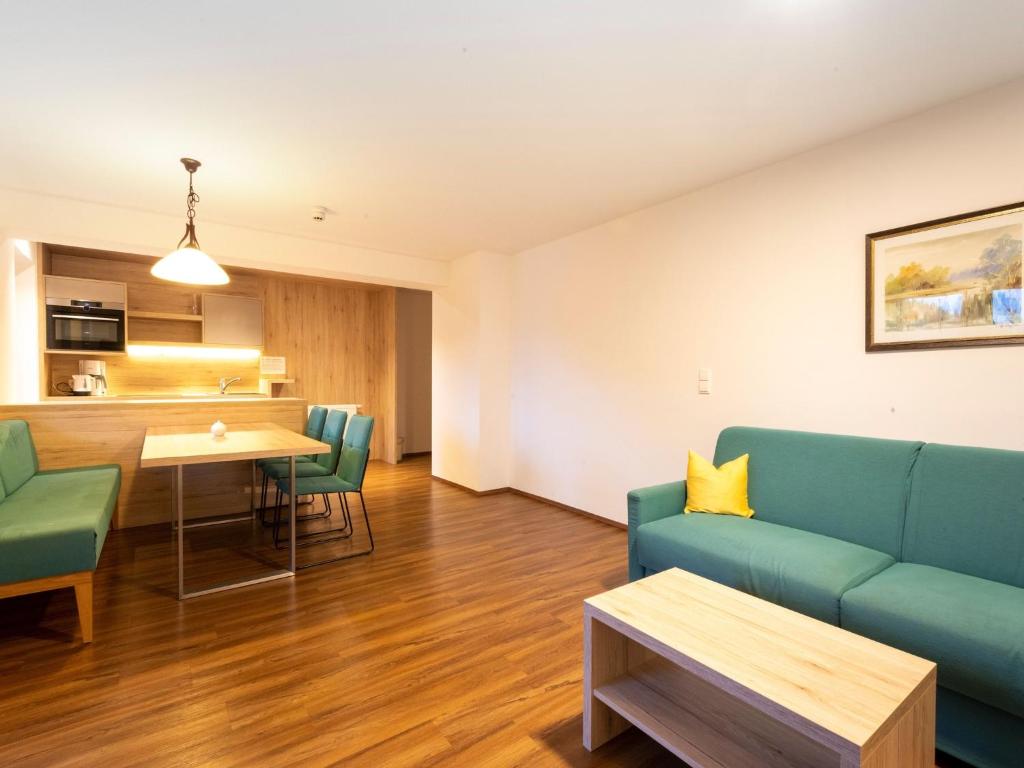 Posezení v ubytování Lovely Apartment with Sauna, Ski Storage, Pool, Terrace
