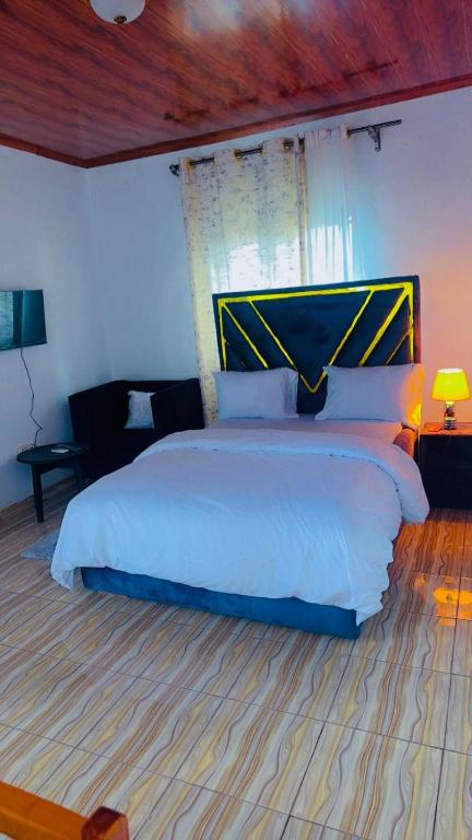 Postel nebo postele na pokoji v ubytování C & C Hotel