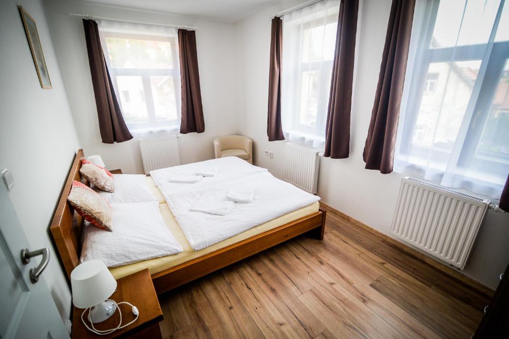 Postel nebo postele na pokoji v ubytování Dueta Apartment