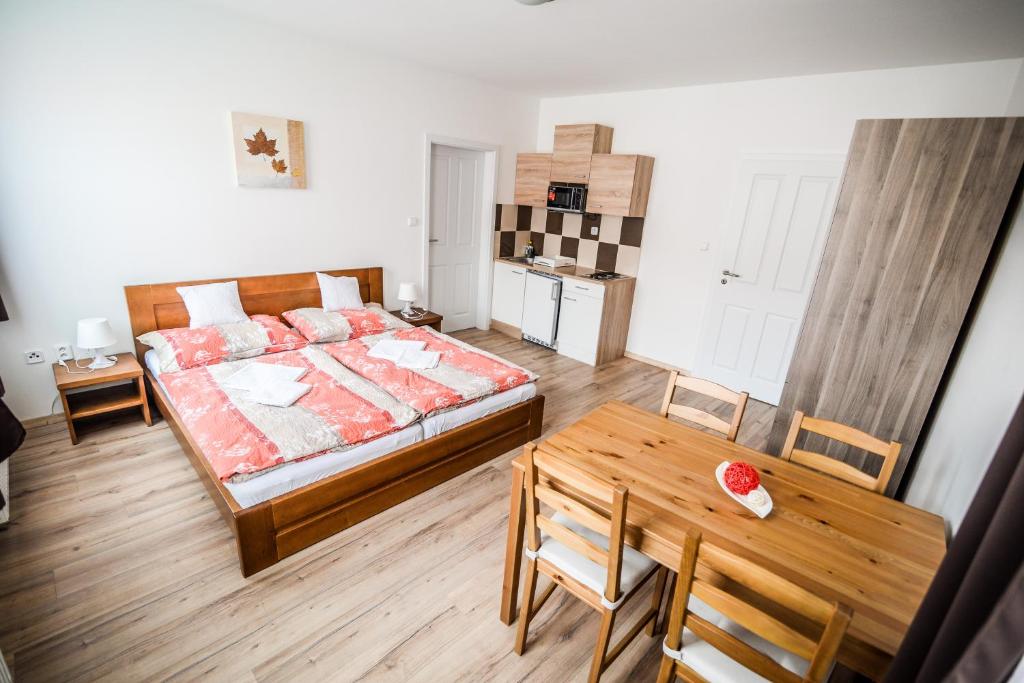Postel nebo postele na pokoji v ubytování Dueta Apartment