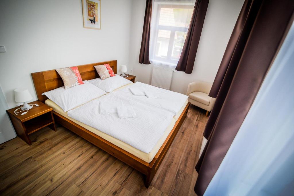 Postel nebo postele na pokoji v ubytování Dueta Apartment