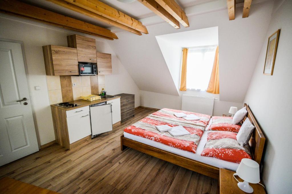 Postel nebo postele na pokoji v ubytování Dueta Apartment