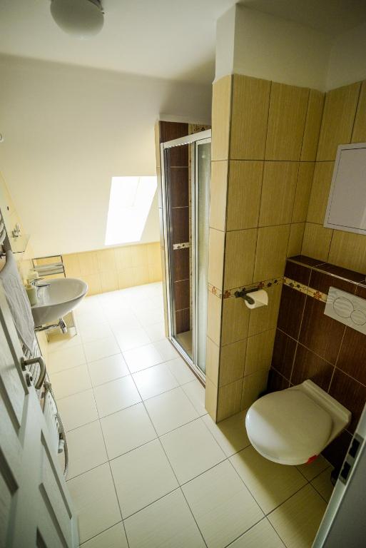 Koupelna v ubytování Dueta Apartment