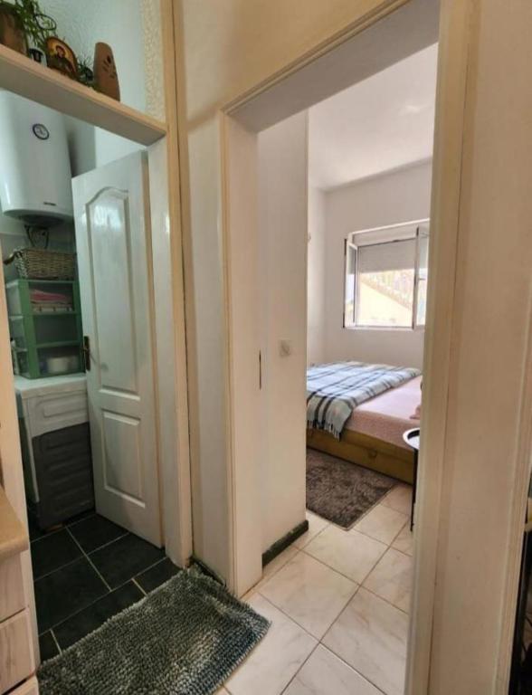 Lova arba lovos apgyvendinimo įstaigoje Apartments Zenit