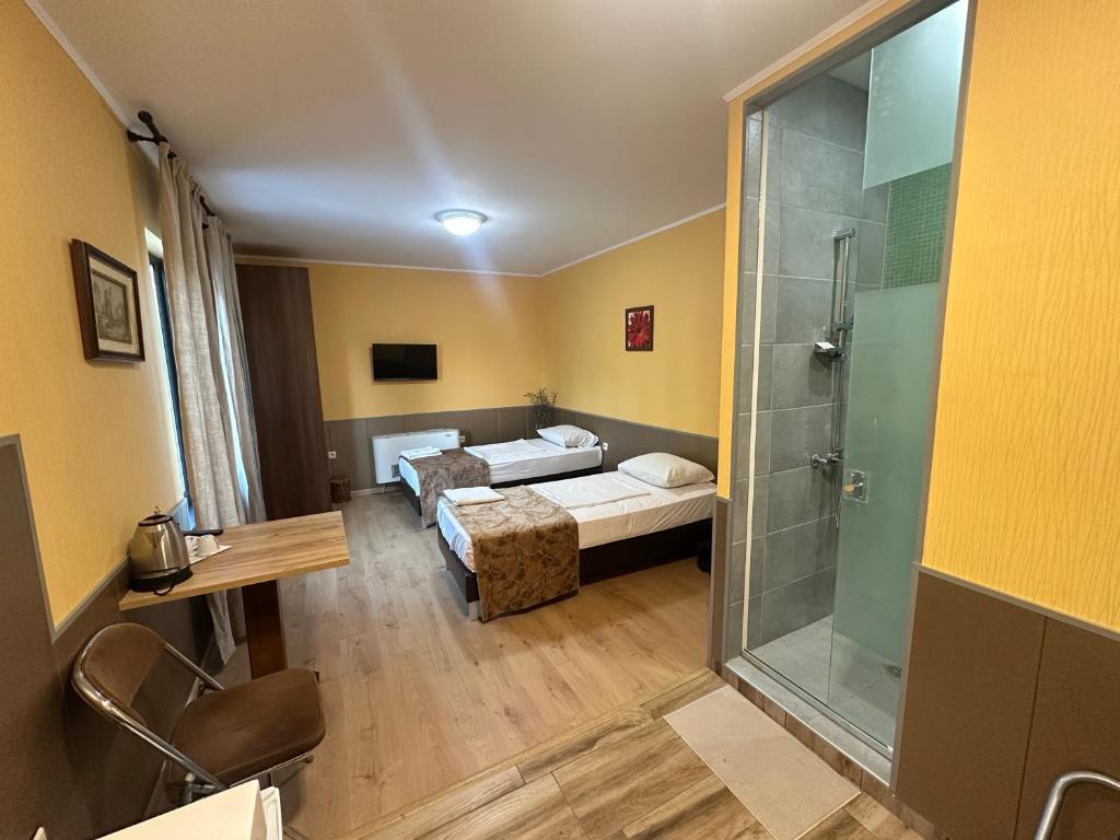 Postel nebo postele na pokoji v ubytování Formula 1 Motel
