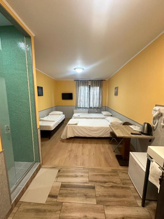Postel nebo postele na pokoji v ubytování Formula 1 Motel