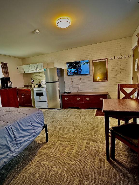 Kuchyň nebo kuchyňský kout v ubytování Caravel Motel