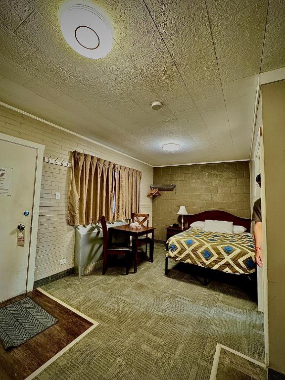 Postel nebo postele na pokoji v ubytování Caravel Motel