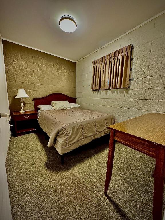 Postel nebo postele na pokoji v ubytování Caravel Motel