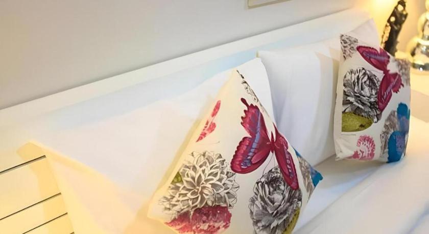 Chic Hotel Suratthaniにあるベッド