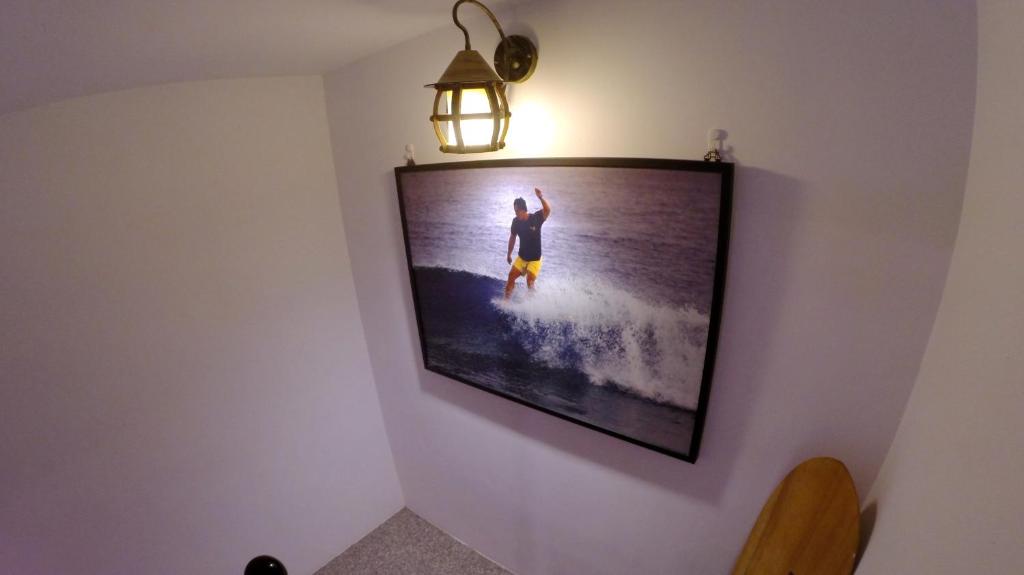 Televiisor ja/või meelelahutuskeskus majutusasutuses Surfspot House