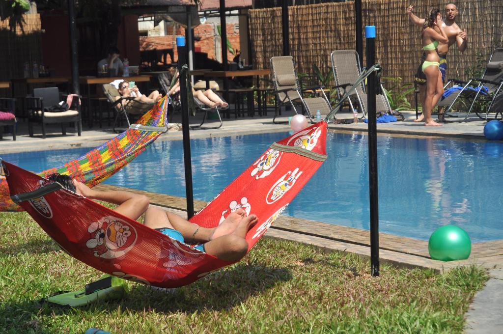 Bazén v ubytování Pool Party Hostel nebo v jeho okolí