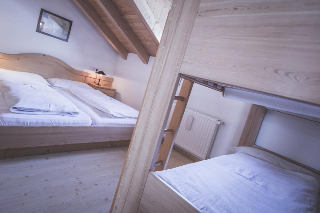 Postel nebo postele na pokoji v ubytování Almhaus Pfister OHG