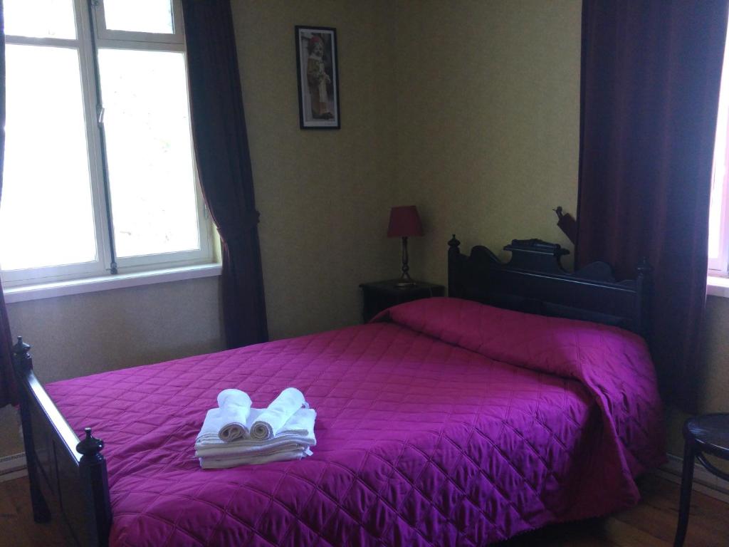 Postel nebo postele na pokoji v ubytování Mamma Mia Guest House
