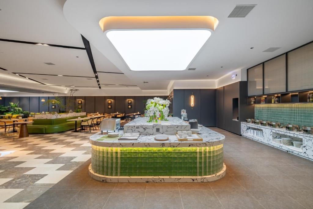 Posezení v ubytování Wyndham Garden Hotel Yiwu International Trade City