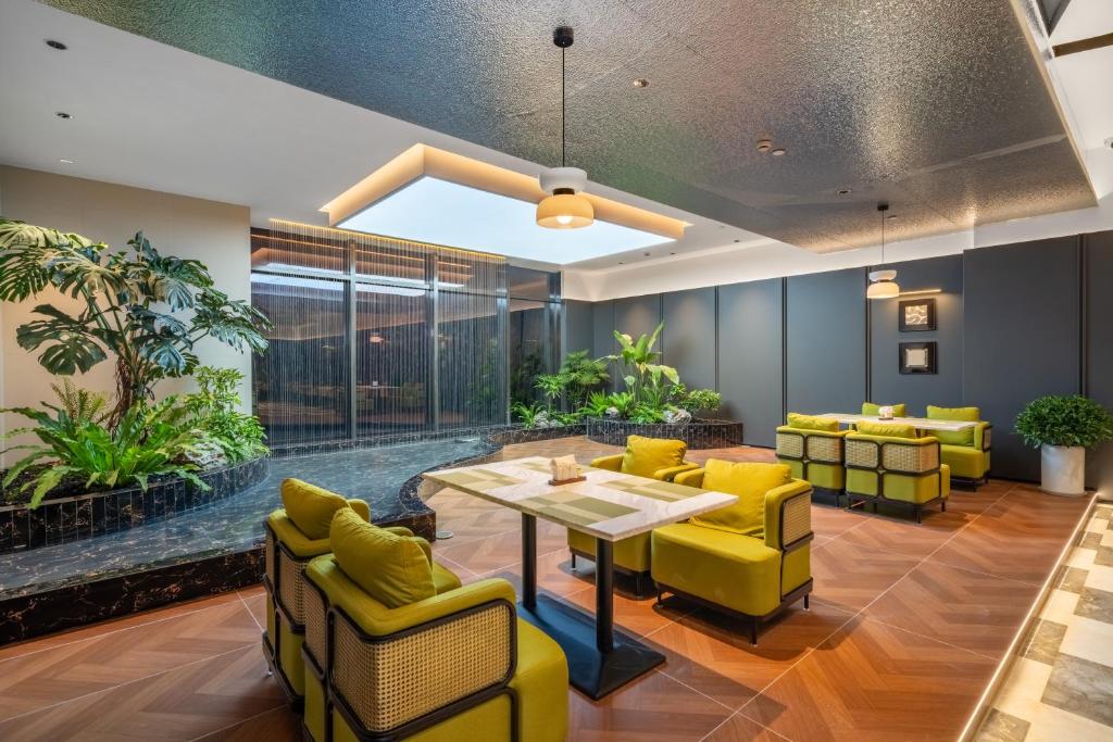 Posezení v ubytování Wyndham Garden Hotel Yiwu International Trade City