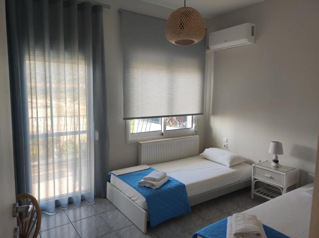 A bed or beds in a room at Maries Seaside Home