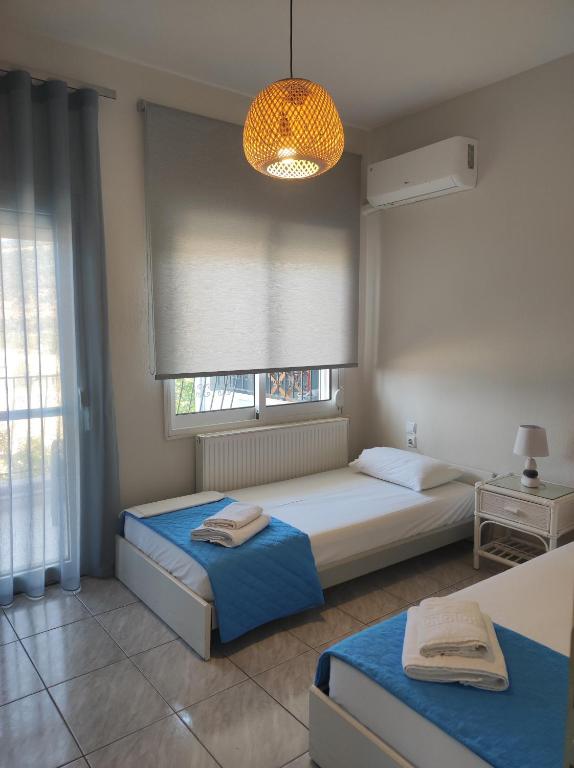 A bed or beds in a room at Maries Seaside Home