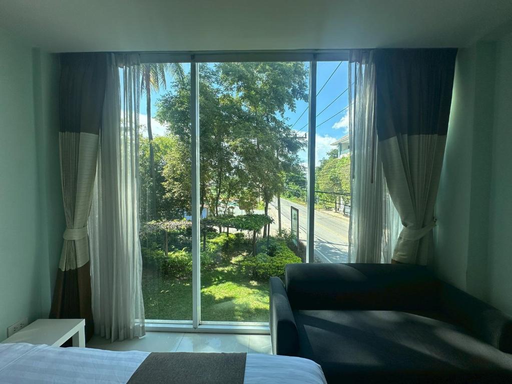 Postel nebo postele na pokoji v ubytování A Hotel Simply