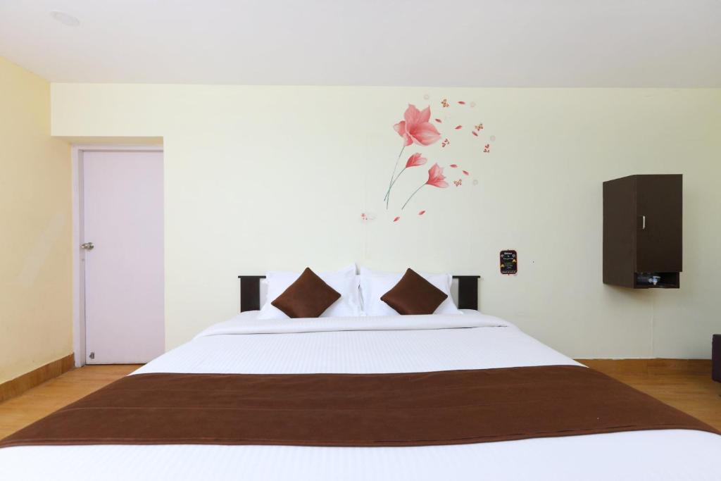 Postel nebo postele na pokoji v ubytování Hotel O India Gate Par View