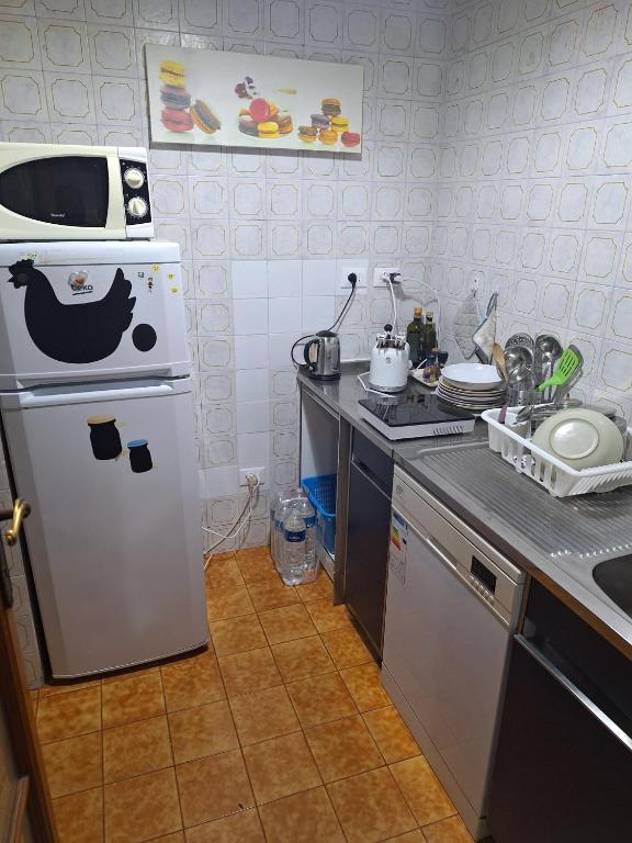 Kuchyň nebo kuchyňský kout v ubytování B&B Colombo