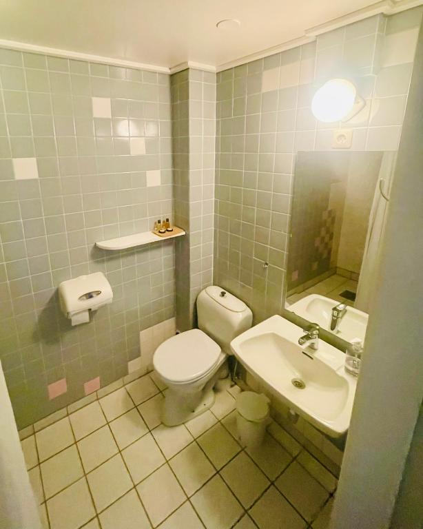 Koupelna v ubytování Suldal Hotell