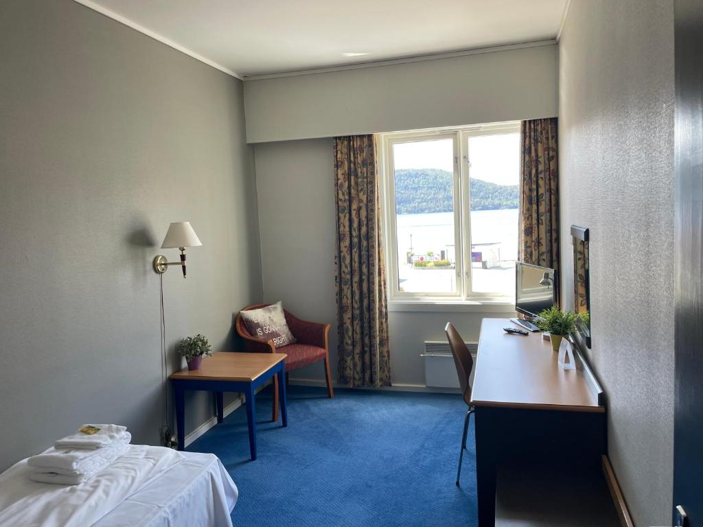 Postel nebo postele na pokoji v ubytování Suldal Hotell