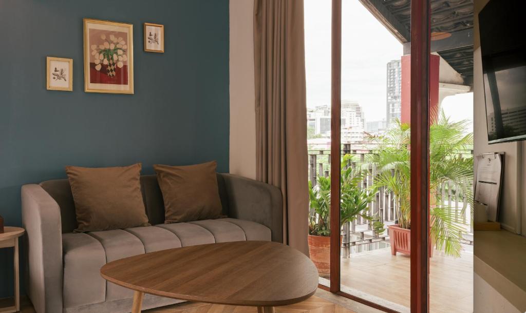Posezení v ubytování House Of Papa Bangkok Siam