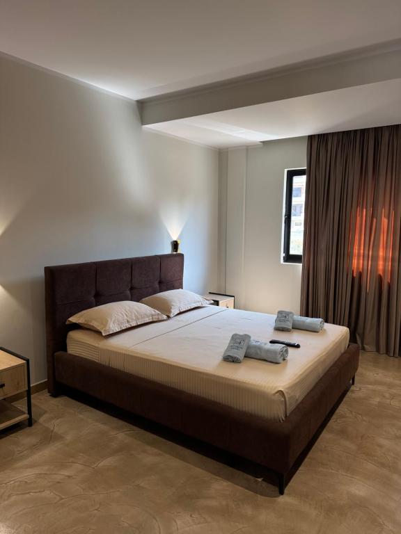 Postel nebo postele na pokoji v ubytování Ritson Hotel
