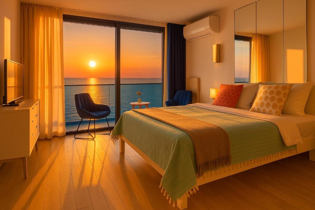 Postel nebo postele na pokoji v ubytování PANORAMA Orbi City Center Suite Sea View